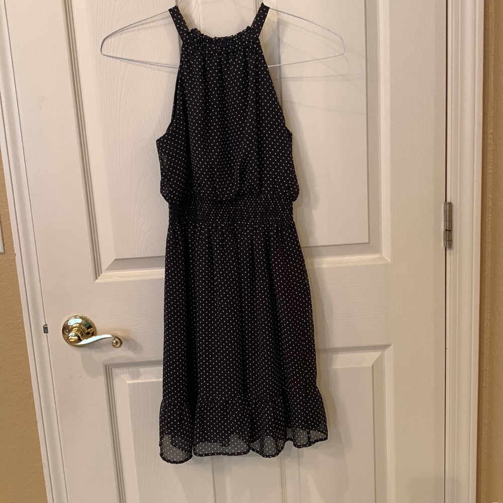 Black dress with white polka dots Girls size 14.